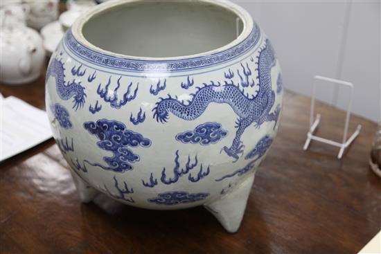 A massive Chinese blue and white dragon tripod censer, Qianlong mark and of the period (1736-95)